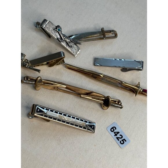 Vintage Mens Tie Clips Lot Of 7 Mixed Designs Sword Gun Harmonica Gold & Silver - Picture 3 of 16